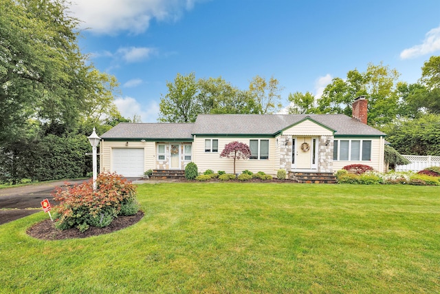 319 Wheeler Park Ave, Fairfield, CT 06825 - ranch-style house with an attached garage, driveway, and a chimney
