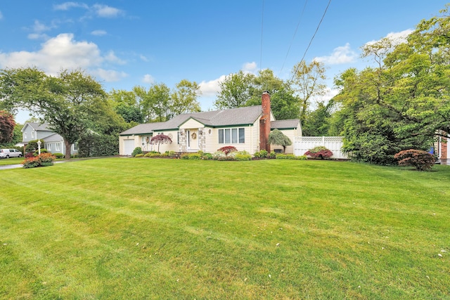 319 Wheeler Park Ave, Fairfield, CT 06825 - view of front facade with an attached garage and a chimney
