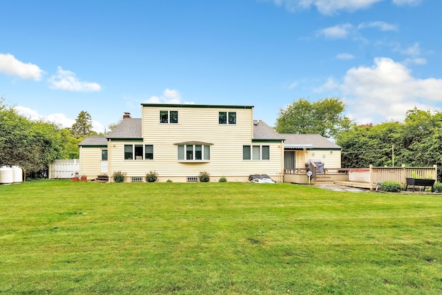 319 Wheeler Park Ave, Fairfield, CT 06825 - back of house with a wooden deck, a lawn, and roof with shingles
