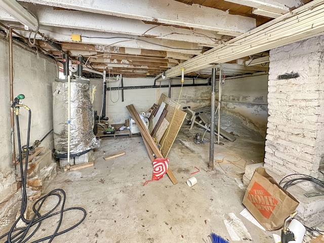 unfinished below grade area featuring gas water heater
