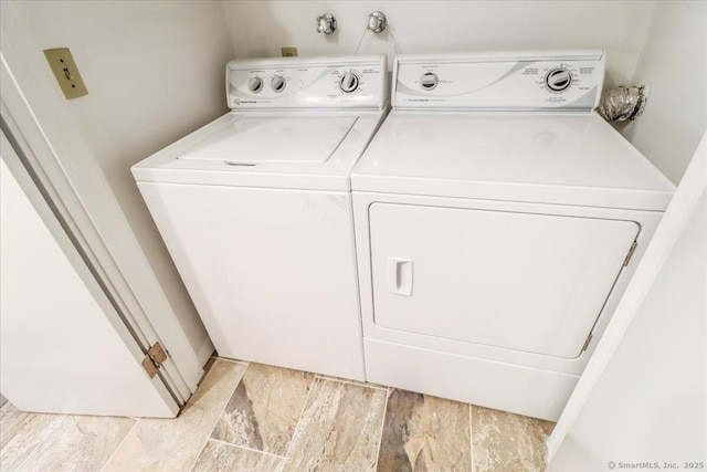 laundry room with washer and clothes dryer