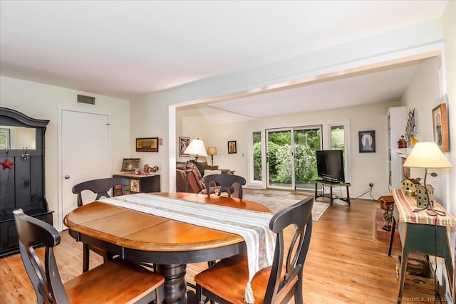 dining room with light wood-type flooring