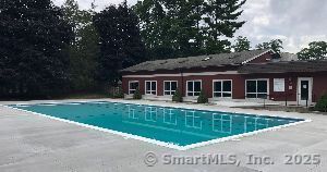 swimming pool with a patio area