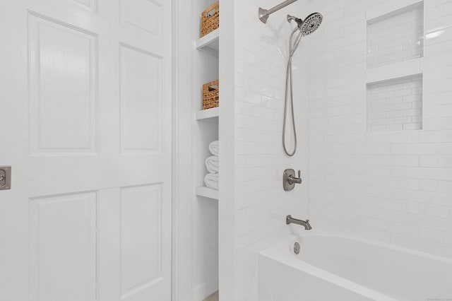 full bath featuring shower / tub combination