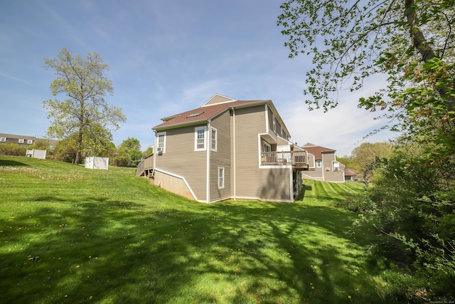 view of property exterior with a yard