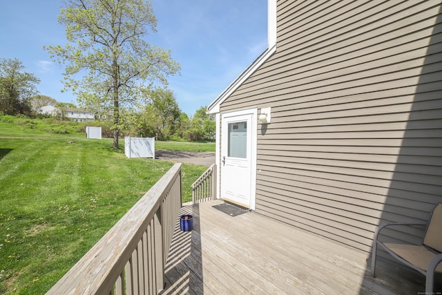deck featuring a lawn
