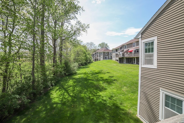 view of yard featuring a residential view