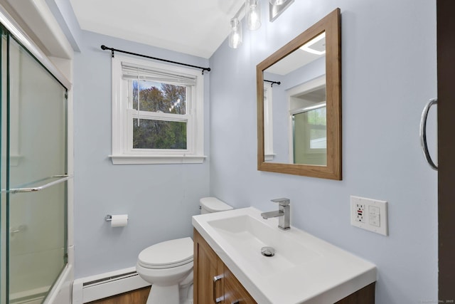 327 Abbe Rd, Enfield, CT 06082 - bathroom featuring toilet, baseboards, baseboard heating, and vanity