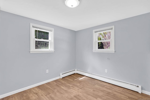 327 Abbe Rd, Enfield, CT 06082 - unfurnished room with baseboards, baseboard heating, and wood finished floors