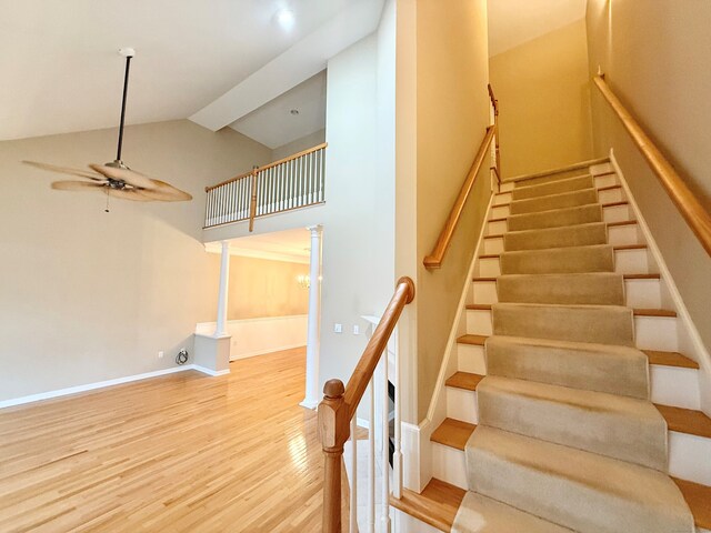 253 Summerfield Gdns Unit 253, Shelton, CT 06484 - staircase featuring wood finished floors, ceiling fan, and high vaulted ceiling