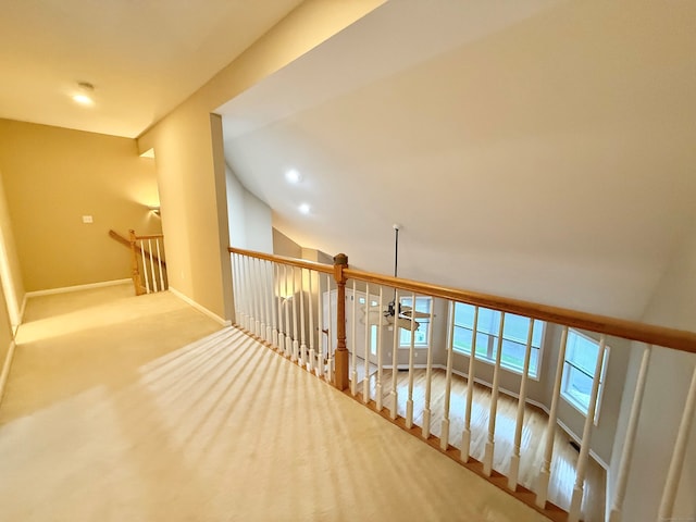253 Summerfield Gdns Unit 253, Shelton, CT 06484 - hallway with an upstairs landing, baseboards, lofted ceiling, and recessed lighting