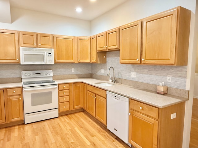 253 Summerfield Gdns Unit 253, Shelton, CT 06484 - kitchen with white appliances, a sink, light wood-style flooring, tasteful backsplash, and recessed lighting