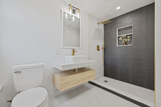 bathroom featuring marble finish flooring, toilet, walk in shower, recessed lighting, and baseboards