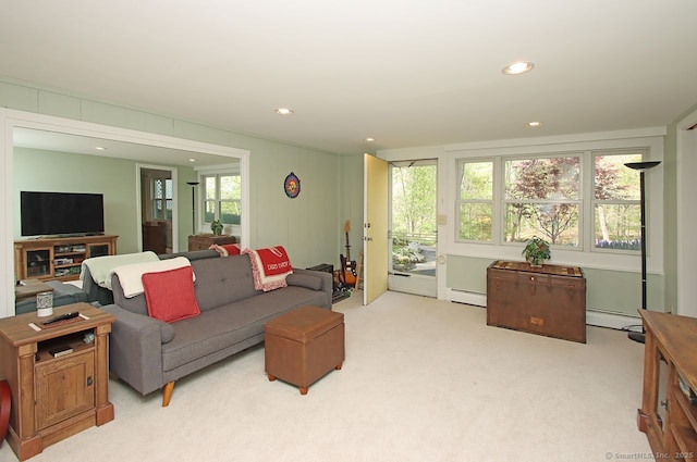 living area featuring recessed lighting, light colored carpet, and baseboard heating