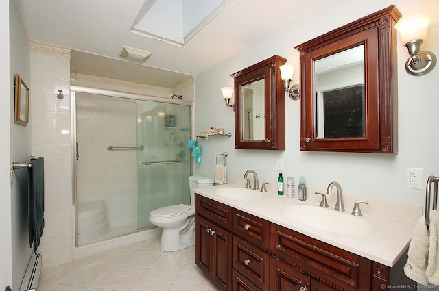 full bathroom featuring visible vents, a sink, and a shower stall