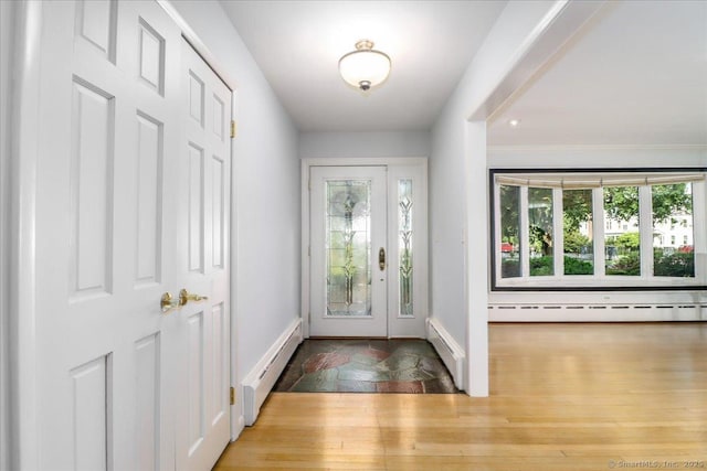 110 Deer Hill Ave, Danbury, CT 06810 - foyer entrance featuring a baseboard radiator, healthy amount of natural light, a baseboard heating unit, and baseboards