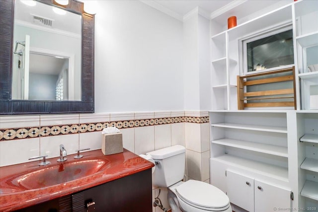 110 Deer Hill Ave, Danbury, CT 06810 - half bath with ornamental molding, vanity, toilet, tile walls, and wainscoting