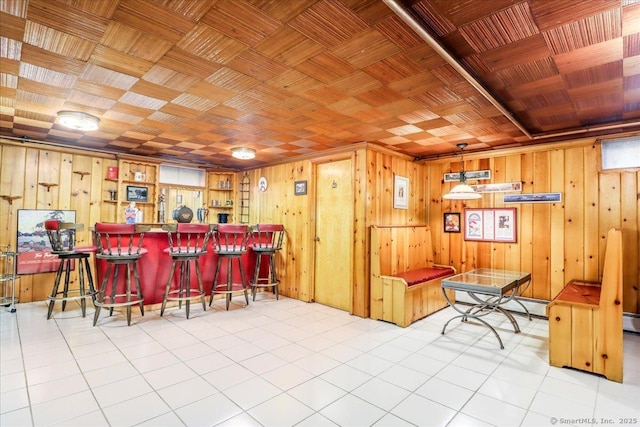 110 Deer Hill Ave, Danbury, CT 06810 - indoor dry bar with wooden walls and tile patterned flooring