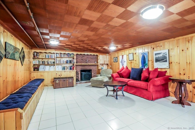 110 Deer Hill Ave, Danbury, CT 06810 - living room featuring wooden walls, wooden ceiling, tile patterned floors, and a brick fireplace