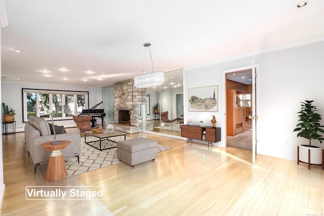 110 Deer Hill Ave, Danbury, CT 06810 - living area with a stone fireplace, wood-type flooring, crown molding, baseboard heating, and recessed lighting