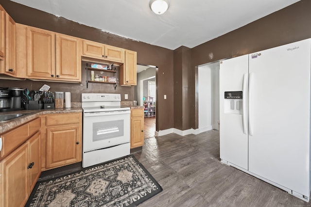 224 1st Ave, West Haven, CT 06516 - kitchen featuring white appliances, dark wood-style flooring, and light brown cabinets