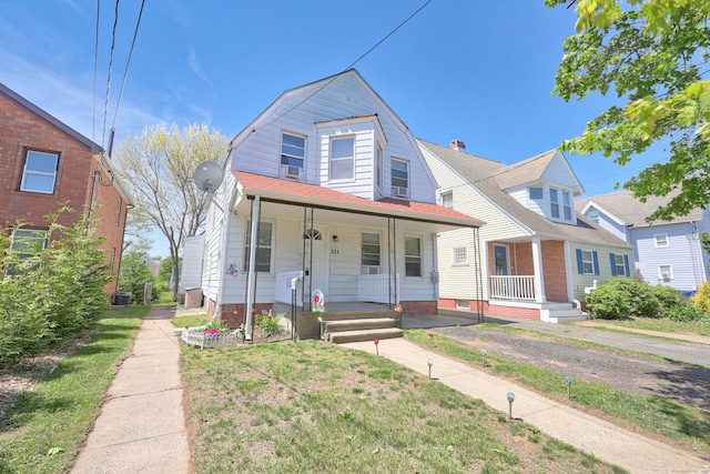 224 1st Ave, West Haven, CT 06516 - view of front of house with covered porch and a gambrel roof
