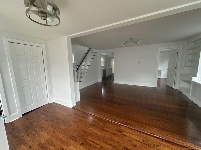 14 Sherman St, Stamford, CT 06902 - interior space with baseboards, stairs, dark wood-style floors, and a notable chandelier