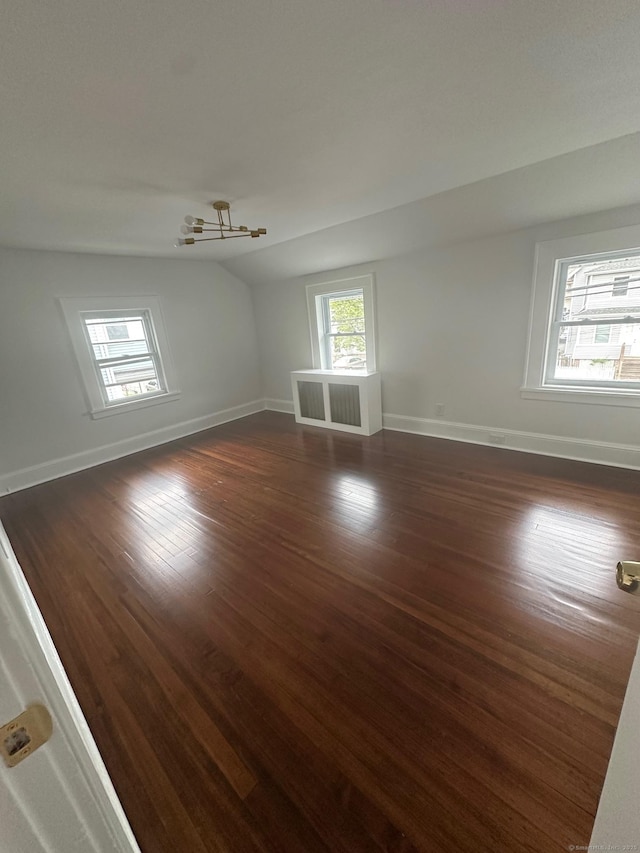 14 Sherman St, Stamford, CT 06902 - empty room with baseboards, dark wood-style floors, and lofted ceiling