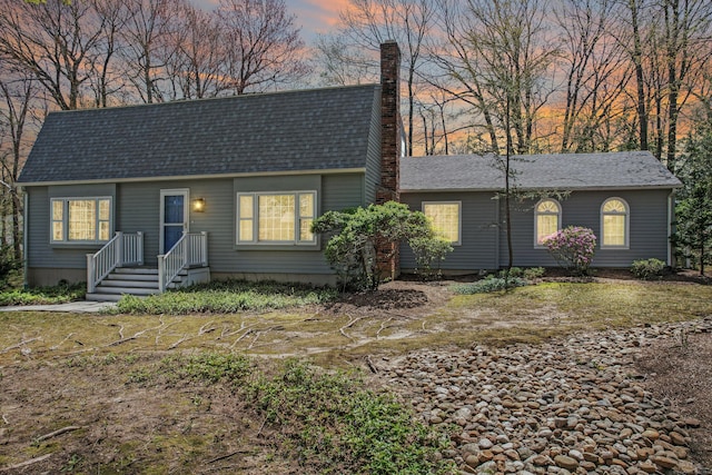7 Partridge Ln, Burlington, CT 06013 - view of front of home with roof with shingles and a chimney