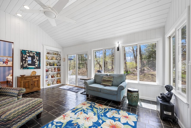 7 Partridge Ln, Burlington, CT 06013 - sunroom / solarium with vaulted ceiling, healthy amount of natural light, stone tile floors, and wooden walls