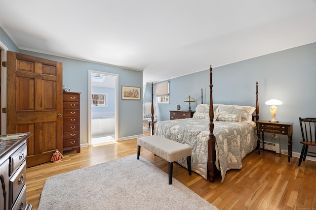 7 Partridge Ln, Burlington, CT 06013 - bedroom with light wood finished floors, baseboard heating, and baseboards