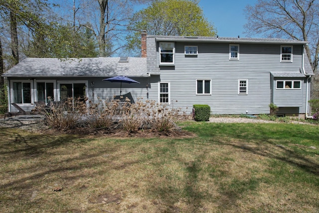 7 Partridge Ln, Burlington, CT 06013 - back of house featuring a chimney and a lawn