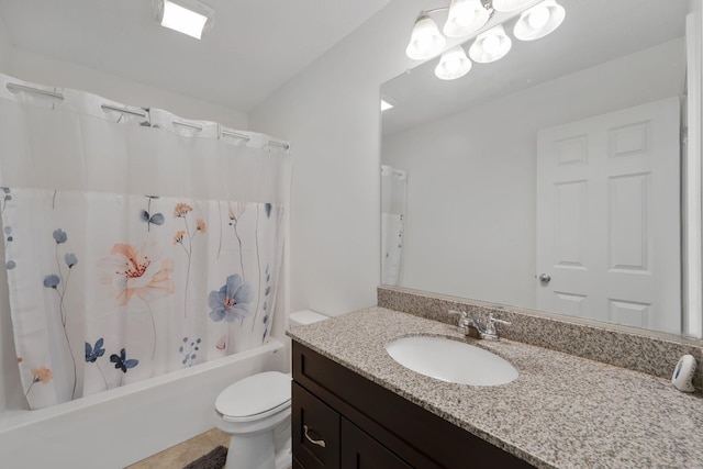 bathroom with shower / bath combo with shower curtain, vanity, toilet, and tile patterned flooring