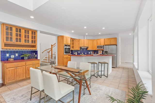28 Drewbarrie Ln, Easton, CT 06612 - dining space with light tile patterned floors, stairway, and recessed lighting