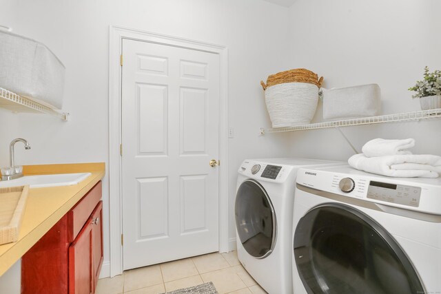 28 Drewbarrie Ln, Easton, CT 06612 - laundry room featuring light tile patterned floors, washing machine and dryer, laundry area, and a sink