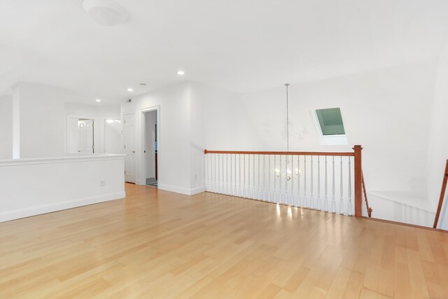 28 Drewbarrie Ln, Easton, CT 06612 - unfurnished room with an inviting chandelier, light wood-style flooring, baseboards, and recessed lighting