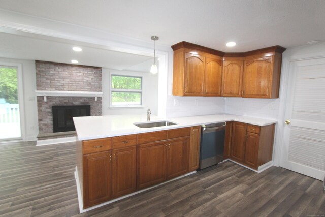 340 Robbins Ave, Newington, CT 06111 - kitchen with brown cabinetry, a sink, dishwasher, and dark wood-style floors
