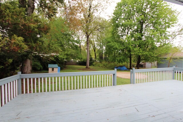 340 Robbins Ave, Newington, CT 06111 - deck featuring an outdoor structure, a yard, and a shed