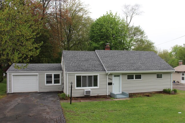 340 Robbins Ave, Newington, CT 06111 - ranch-style home featuring an attached garage, a chimney, a front lawn, and aphalt driveway