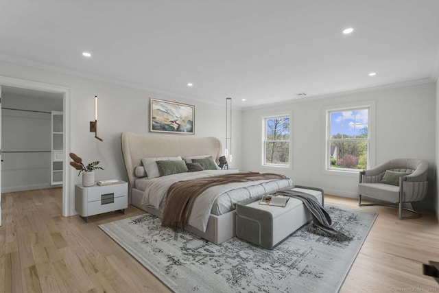 bedroom featuring recessed lighting, baseboards, ornamental molding, and light wood-type flooring