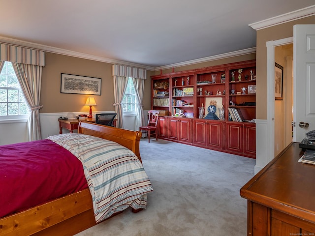 bedroom featuring carpet floors and crown molding