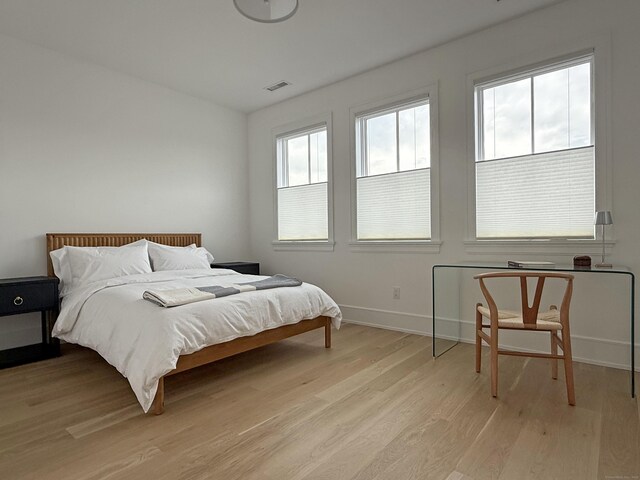785 Post Rd E Unit 303, Westport, CT 06880 - bedroom with light wood-style floors and baseboards
