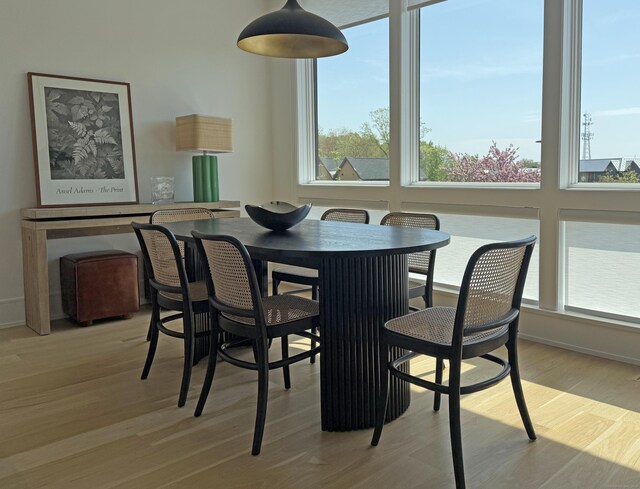 785 Post Rd E Unit 303, Westport, CT 06880 - dining room featuring light wood-type flooring and baseboards