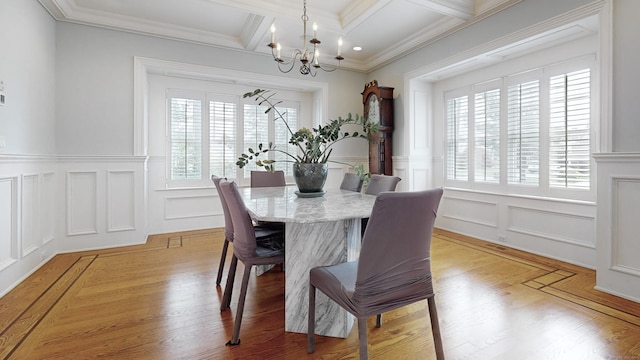 27 Dock Rd, Milford, CT 06460 - dining area with crown molding, an inviting chandelier, wainscoting, a decorative wall, and beamed ceiling