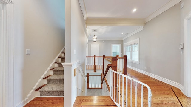 27 Dock Rd, Milford, CT 06460 - staircase with crown molding, recessed lighting, baseboards, and wood finished floors