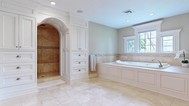 27 Dock Rd, Milford, CT 06460 - bathroom featuring visible vents, recessed lighting, a garden tub, and a shower stall