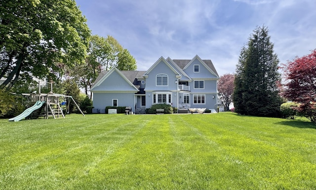 27 Dock Rd, Milford, CT 06460 - exterior space featuring a lawn, a playground, and a chimney