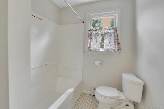 bathroom with toilet, baseboards, tile patterned floors, a baseboard heating unit, and shower / bath combination