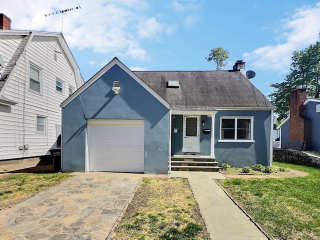 141 Arcadia Ave, Bridgeport, CT 06604 - view of front of property with stucco siding, a chimney, a shingled roof, an attached garage, and driveway