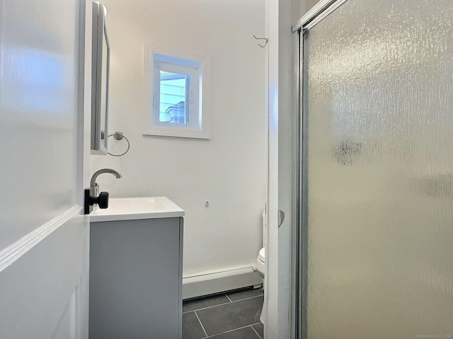 141 Arcadia Ave, Bridgeport, CT 06604 - full bath with tile patterned flooring, a baseboard radiator, a stall shower, and vanity